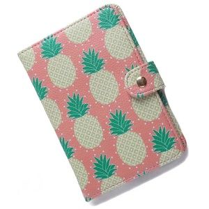Pineapple passport holder.